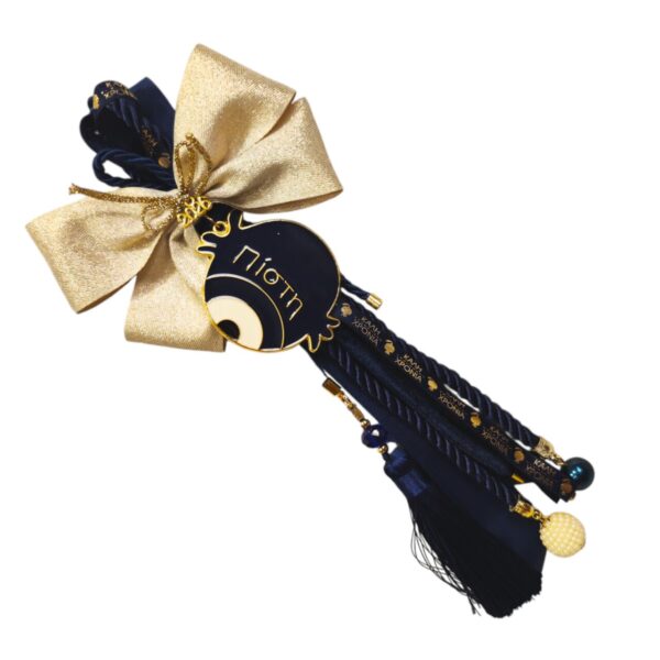 Χειροποίητο luxury γούρι 2026 με μεταλλικό ρόδι από σμάλτο σε μπλε και χρυσές λεπτομέρειες.