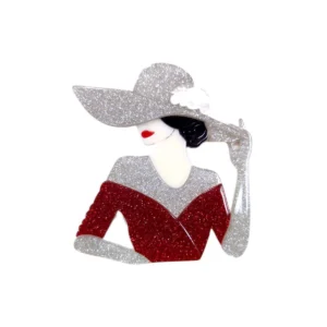Καρφίτσα plexiglass με φιγούρα γυναίκας σε glitter ασημί και κόκκινο.