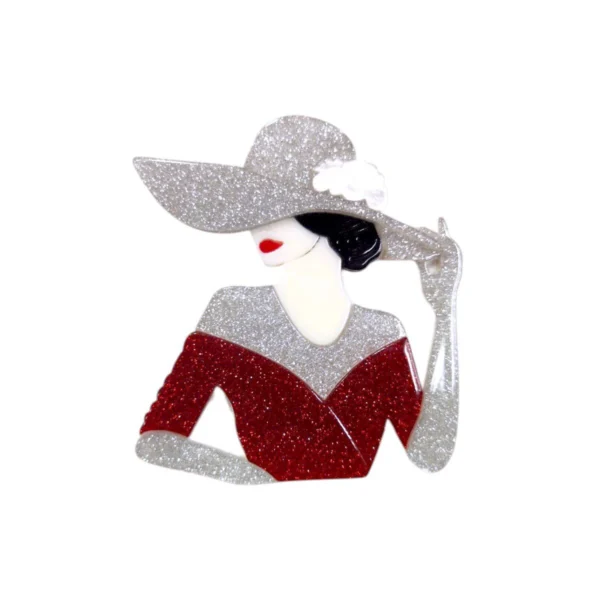 Καρφίτσα plexiglass με φιγούρα γυναίκας σε glitter ασημί και κόκκινο.