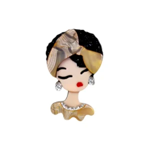 Καρφίτσα plexiglass με αφρικανική φιγούρα, glitter τουρμπάνι και κοσμήματα.