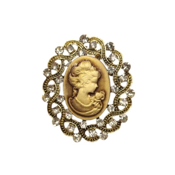 Vintage καρφίτσα με χρυσό προφίλ και στρας – ρομαντική πολυτέλεια με ιστορική αισθητική.