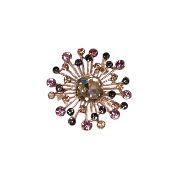 Καρφίτσα με σαμπανιζέ κρύσταλλο και πολύχρωμα στρας – για εμφανίσεις που ξεχωρίζουν.