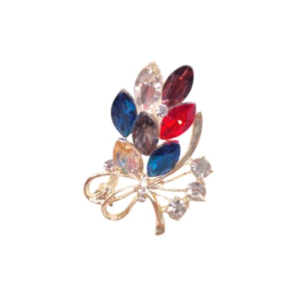 Καρφίτσα-ανθοδέσμη με πολύχρωμες πέτρες και στρας – φρέσκια πολυτέλεια με ανοιξιάτικη λάμψη.