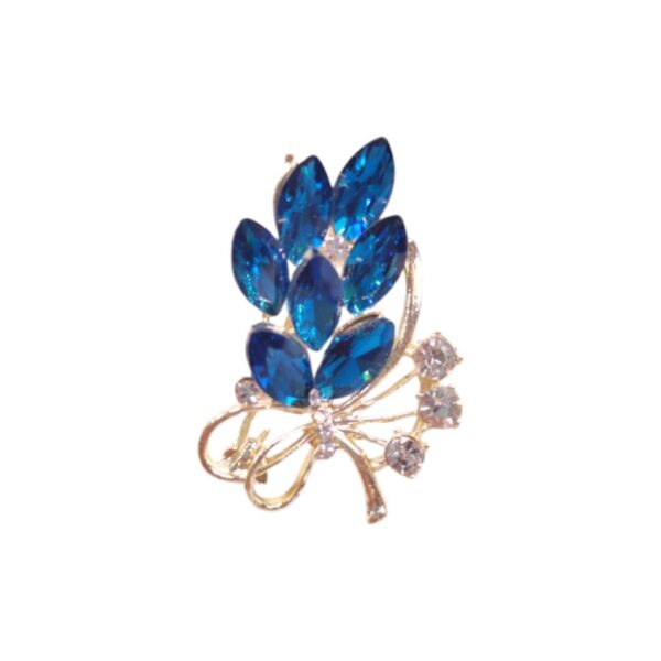 Καρφίτσα-ανθοδέσμη με πολύχρωμες πέτρες και στρας – φρέσκια πολυτέλεια με ανοιξιάτικη λάμψη.