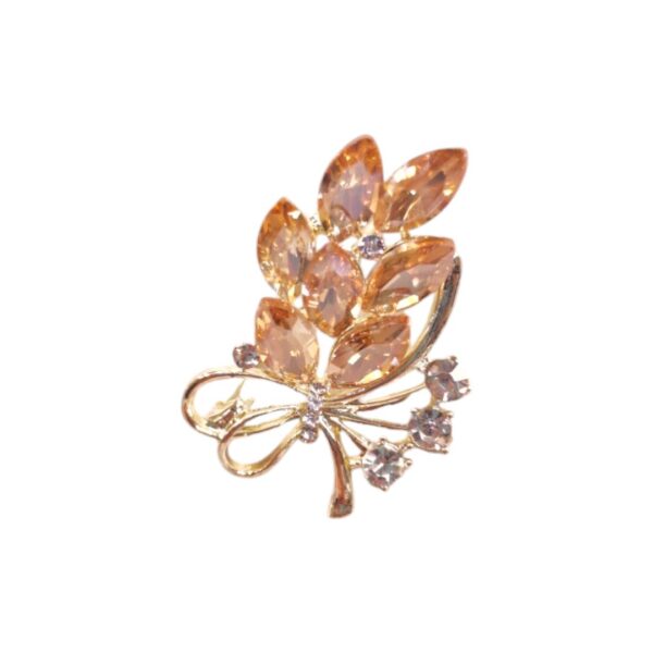 Καρφίτσα-ανθοδέσμη με πολύχρωμες πέτρες και στρας – φρέσκια πολυτέλεια με ανοιξιάτικη λάμψη.