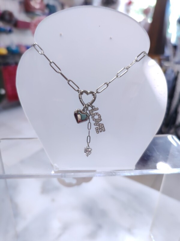 Pure Affection: Ασημί Ατσάλινο Κολιέ Love με Πολυτελή Charms & Ζιργκόν